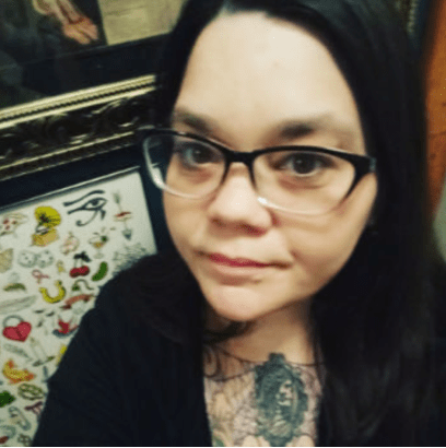 Lei Wiley-Mydske, a woman with dark hair and glasses